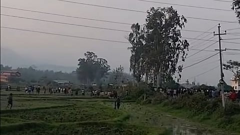 A mob clashed with security personnel and set fire to two vehicles in Manipur’s Bishnupur on Tuesday, prompting authorities to impose prohibitory