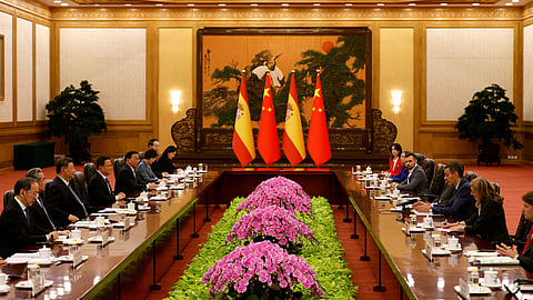 China's President Xi Jinping, third from left, and Spain's Prime Minister Pedro Sanchez, third from right, attend a meeting at the Great Hall of the People in Beijing on Tuesday, April 14, 2026.