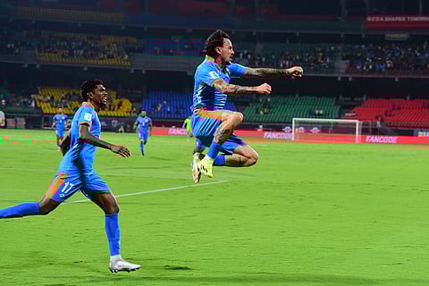 Ryan Williams (C) celebrates his first India goal