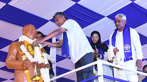 Minister Satish Jarkiholi pays floral tribute to statue of BR Ambedkar on the occasion of Ambedkar Jayanti.