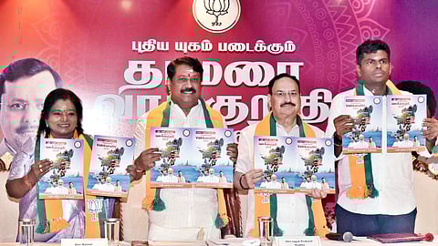 Union Minister J P Nadda, accompanied by TN BJP president Nainar Nagenthran, former party chief K Annamalai, and Mylapore candidate Tamilisai Soundararajan, releases the BJP manifesto for the upcoming polls in Chennai on Tuesday.