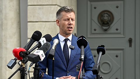 Peter Magyar, leader of the election-winning Tisza Party, talks to the media before meeting Hungarian President Tamas Sulyok in the presidential Alexander Palace in Budapest, Hungary, on Wednesday, April 15, 2026. 