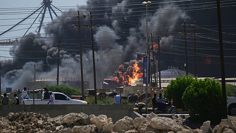 Smoke billows after drone strikes by the paramilitary Rapid Support Forces (RSF) targeted the northern port in the Red Sea city of Port Sudan, Sudan, May 6, 2025.