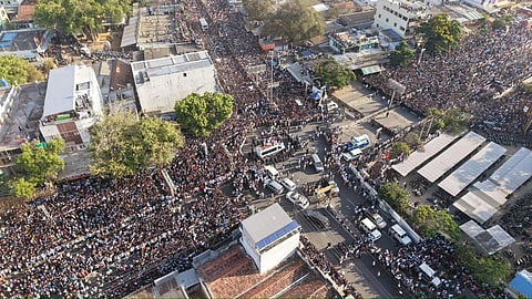 An aerial view of Tamilaga Vettri Kazhagam president Vijay arriving for roadshow from Coimbatore International Airport to Perumanallur in Tiruppur district on Tuesday.