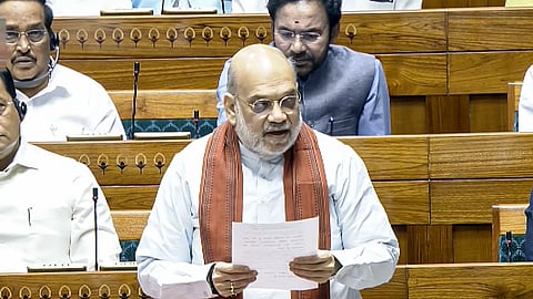 Union Home Minister Amit Shah speaks in the Lok Sabha during the Special session of Parliament, in New Delhi, Thursday, April 16, 2026.