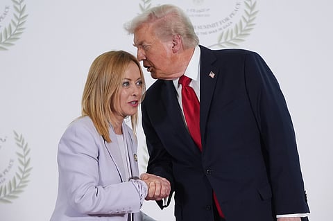 President Donald Trump greets Italy's Prime Minister Giorgia Meloni during summit to support ending the more than two-year Israel-Hamas war in Gaza after a breakthrough ceasefire deal, Oct. 13, 2025, in Sharm El Sheikh, Egypt