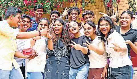 Students of Christ Nagar Central School at Kowdiar in Thiruvananthapuram celebrating after the announcement of CBSE exam results 