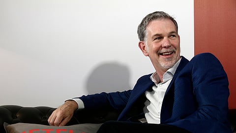 FILE - Netflix founder and CEO Reed Hastings smiles during an interview in Barcelona, Spain, Feb. 28, 2017.