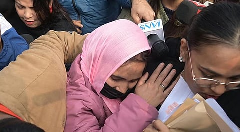 Survivor in the Unnao rape case leaves from Supreme Court, in New Delhi.