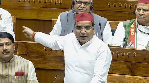 Samajwadi Party MP Dharmendra Yadav speaks in the Lok Sabha during the Special session of Parliament, in New Delhi, Thursday, April 16, 2026.