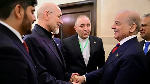 Pakistani Prime Minister Shehbaz Sharif (R) and Iran Parliament Speaker Mohammad Bagher Ghalibaf among the Iranian delegation after the conclusion of the Islamabad talks last week