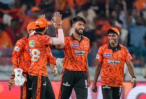 Sunrisers Hyderabad's Praful Hinge, second right, with teammates celebrates after the wicket of Rajasthan Royals' Vaibhav Sooryavanshi during the Indian Premier League (IPL) 2026 T20 cricket match between Sunrisers Hyderabad and Rajasthan Royals, at Rajiv Gandhi International Stadium in Hyderabad, Telangana, Monday, April 13, 2026.