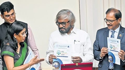 Forest, Ecology and Environment Minister Eshwar B Khandre releases a brochure at the curtain raiser of FKCCI Global CSR and Sustainability Summit—2026 in Bengaluru on Thursday.