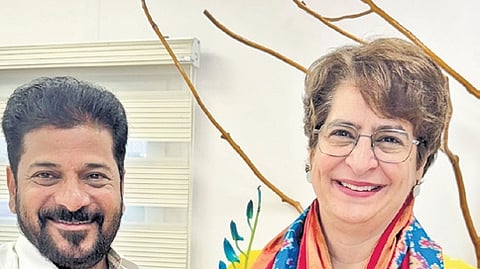 Revanth Reddy with Priyanka Gandhi in New Delhi on Saturday