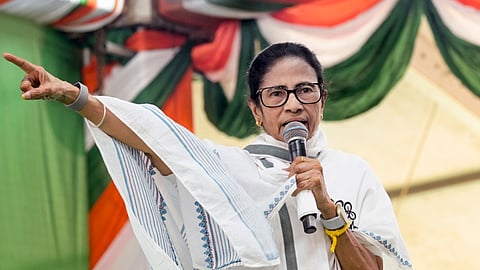 In this image received on April 17, 2026, West Bengal Chief Minister Mamata Banerjee speaks during a public meeting in support of party candidates ahead of the Assembly elections, in Durgapur. 
