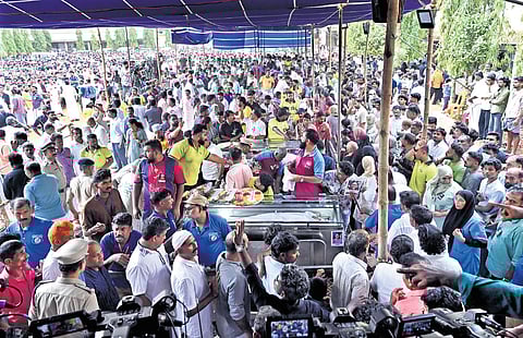 People throng the school ground to pay their final respects to the teaching and non-teaching staff of Kuruva GLPS and GUP School, who died in the Valparai accident.