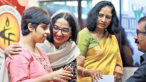 Vizhinjam Port Managing Director Divya S Iyer with Tiffany Brar after honouring her at the launch of the World Malayalee Federation Karuthal initiative.