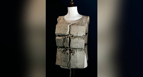 FILE - A Titanic life-preserver, belong to a survivor is shown, London, Wednesday, May 16, 2007.