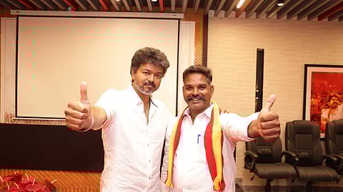 Vijay urged voters in Salem district to back K. Premakumar, a former administrator of his fan club.