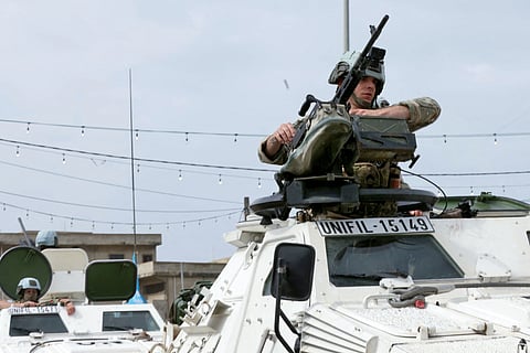 French contingent vehicles serving with the United Nations Interim Force in Lebanon (UNIFIL) cross the Qasmiyeh Bridge heading toward Sidon and Beirut, on April 19, 2026.