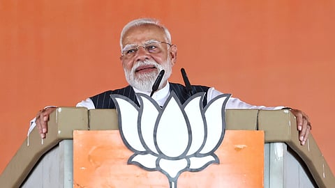 Prime Minister Narendra Modi addresses during a public meeting ahead of West Bengal Assembly elections, in Bishnupur, West Bengal.