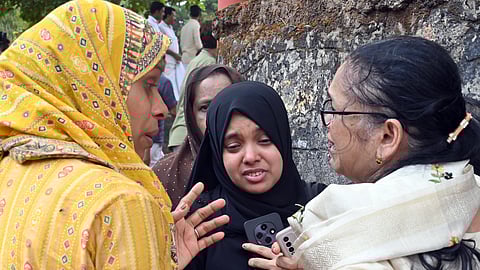 Asnath, the only remaining teacher of Kuruva GLPS, breaks down in tears as she shares her grief.