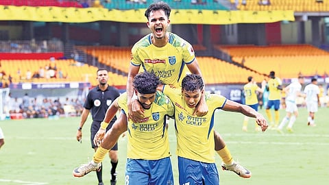 Kerala Blasters FC players celebrate their second goal against Jamshedpur FC in the Indian Super League match at Jawaharlal Nehru Stadium on Saturday.