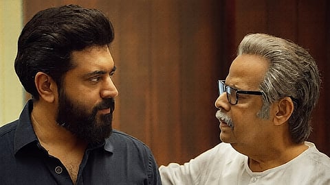 Nivin Pauly (L) and Balachandra Menon (R) in Prathichaya