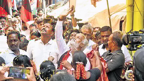 DMK candidate and Minister P K Sekarbabu campaigning in the Harbour constituency on Sunday. 