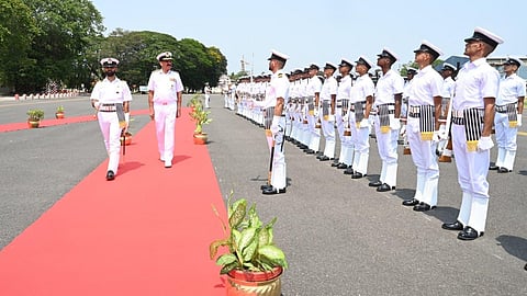 Chief of Naval Staff Admiral Dinesh K Tripathi being accorded a ceremonial guard of honour at INS Garuda, the naval air station, in Kochi on Sunday.