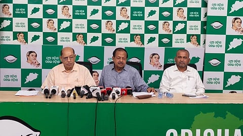 BJD vice-president Debi Prasad Mishra, deputy leader of the Opposition Prasanna Acharya and general secretary Bijay Nayak addressing a press conference.