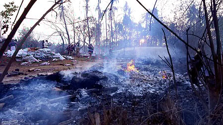 Fire force personnel dousing the blaze at the blast site at Mundathikode in Thrissur