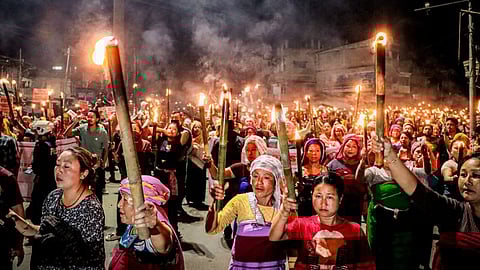 ‘Meira paibis’ (torch-bearers) hold a protest against the Tronglaobi killing incident in Imphal 