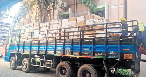 Cigarette boxes being ferried from the customs warehouse in Kozhikode to an undisclosed cement factory in central Kerala for disposal.