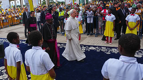Pope Leo XIV arrives at the Basilica of the Immaculate Conception on the 10th day of his 11-day pastoral visit to Africa, in Mongomo, Equatorial Guinea, Wednesday, April 22, 2026.
