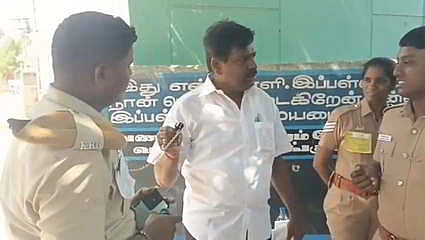 Former DMK MLA P Kamaraj confronted the police personnel over the use of a whistle, symbol of TVK, inside the polling station at Krishnarayapuram in Karur, leading to a brief verbal altercation.