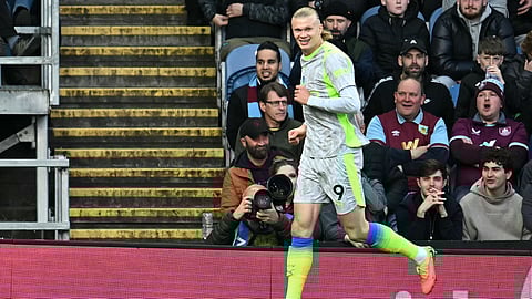 Manchester City's Erling Haaland celebrates scoring the team's first goal during the EPL football match between Burnley and Manchester City at Turf Moor in Burnley, north-west England on April 22, 2026.