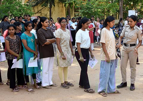 Students before entering the examination hall to appear for the CET exam.