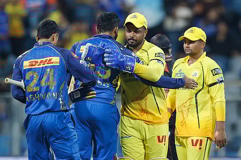 CSK and MI players greet each other after the match at the Wankhede Stadium on Thursday