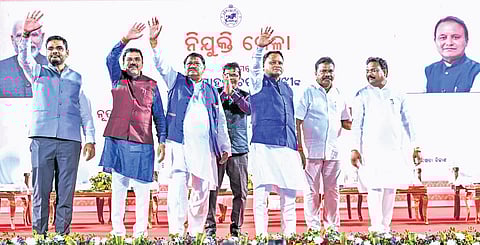 Chief Minister Mohan Charan Majhi, Union Minister Jual Oram and others during the programme