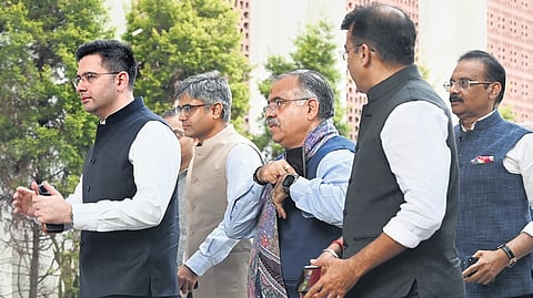 AAP Rajya Sabha MPs Raghav Chadha, Sandeep Pathak and others arrive to meet BJP president Nitin Nabin, before their merger in New Delhi on Friday | Parveen Negi