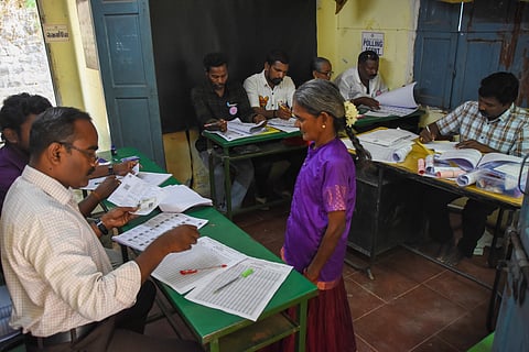 A Kaani tribal woman casting her vote on Thursday.