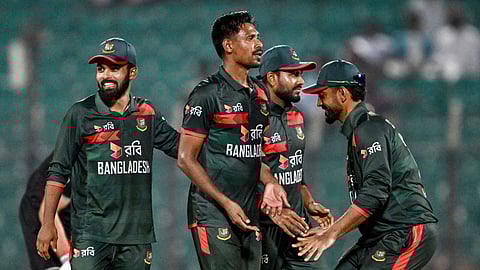 Bangladesh's Mustafizur Rahman (2L) celebrates with teammates after taking the wicket of New Zealand's Will O’Rourke during the third ODI cricket match between Bangladesh and New Zealand on April 23, 2026.