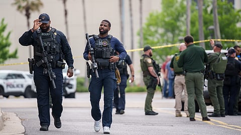 Baton Rouge police and Sheriff deputies respond to a mass shooting at the Mall of Louisiana, Thursday, April 23, 2026, in Baton Rouge, La.