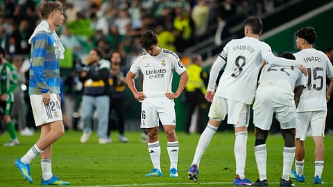 Real Madrid players stand dejected after a La Liga soccer match between Real Betis and Real Madrid in Seville, Spain, Friday, April 24, 2026.
