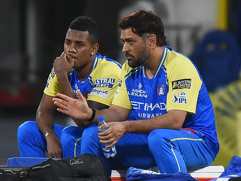 MS Dhoni (R) with Akeal Hosein during nets at Chepauk on Saturday