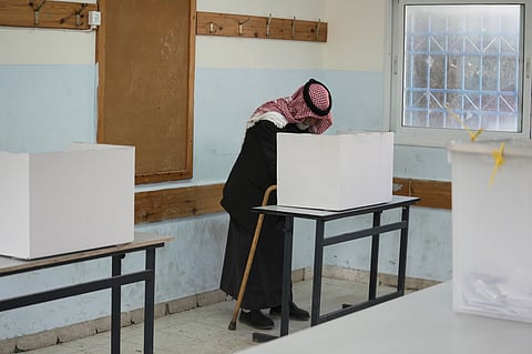 A Palestinian man votes in local elections, the first in two decades in Gaza and the first in the occupied West Bank since the start of the Israel-Hamas war in Al-Ubaidiya, West Bank, Saturday, April 25, 2026. 