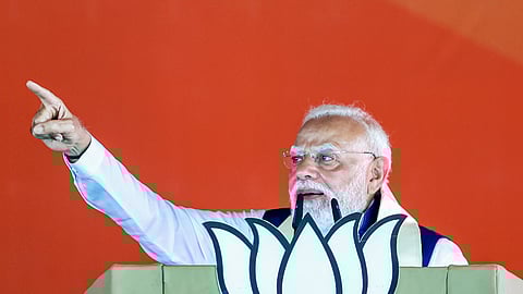 Prime Minister Narendra Modi addresses a public meeting during the West Bengal Assembly elections, at Bongaon, in North 24 Parganas.