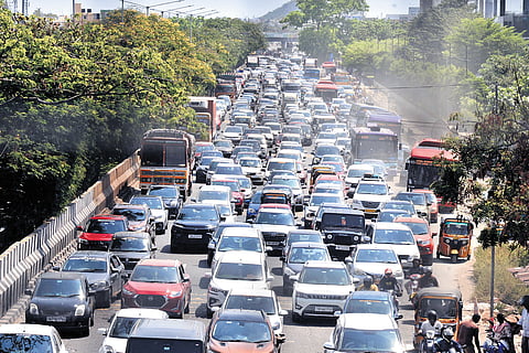 Traffic in Perungalathur on Wednesday as voters went to their native place.