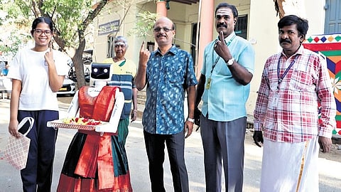 A robot was deployed to welcome voters at a government arts college in Coimbatore on election day.